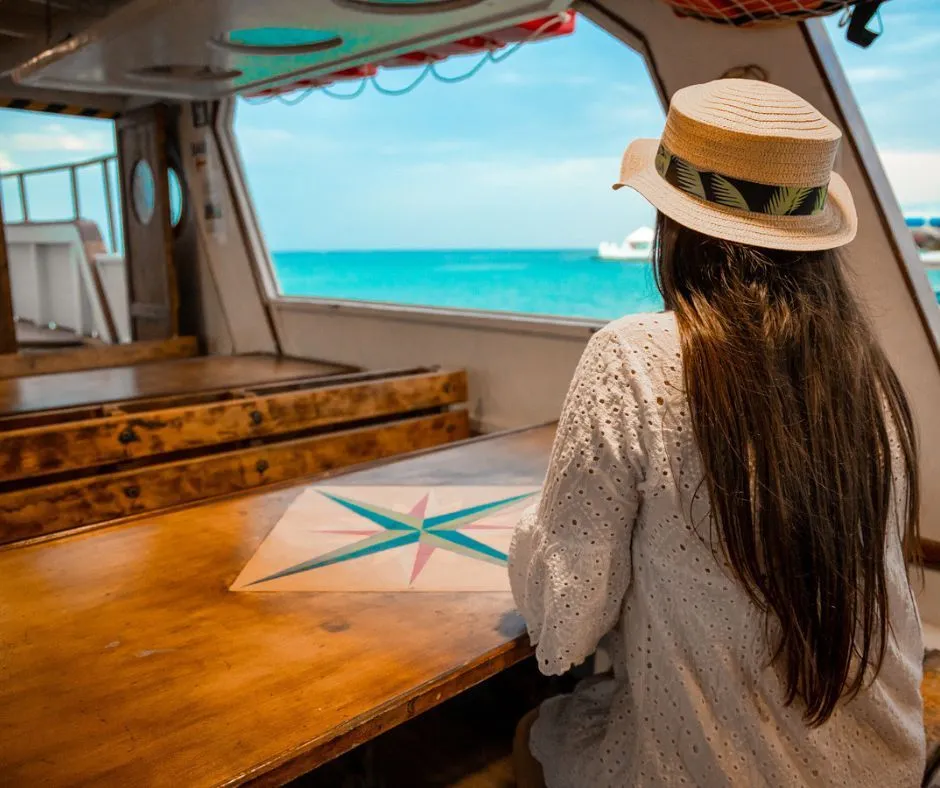 Aperitivo in barca al tramonto con soste bagno a Porto Cesareo