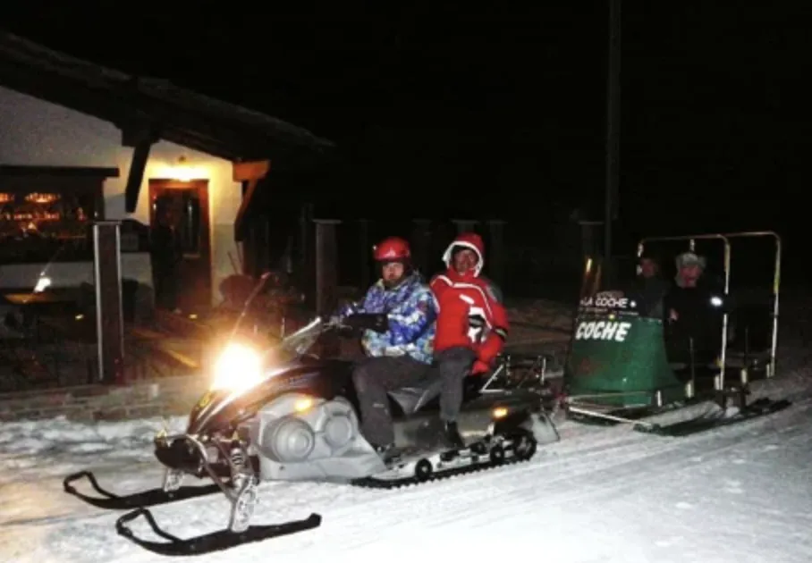 Cena in baita con trasporto in motoslitta a Claviere in Alta Val di Susa