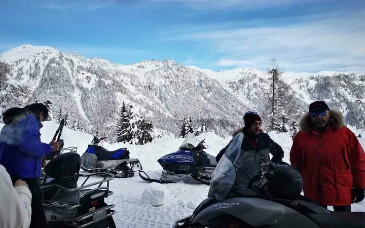 Escursione in motoslitta con degustazione sul Monte Pura da Sauris