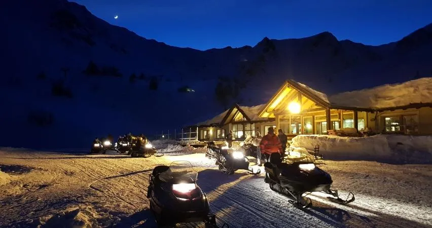 Escursione in motoslitta e cena in baita al Passo del Tonale