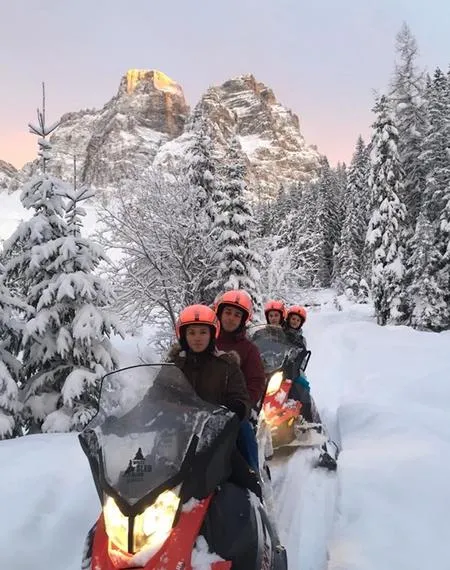 Escursione in motoslitta nelle Dolomiti ad Alleghe