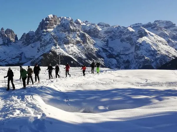 Ciaspolata nei boschi a Madonna di Campiglio
