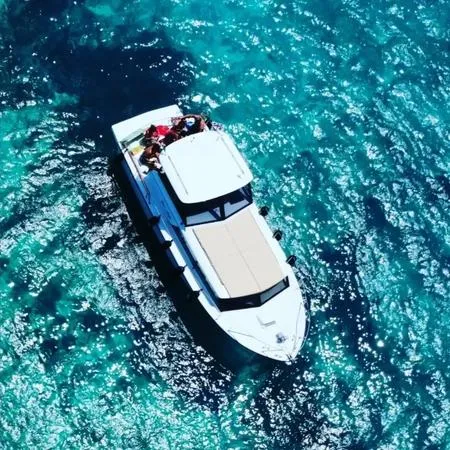 Giornata in motoscafo d’epoca con pranzo da Palau