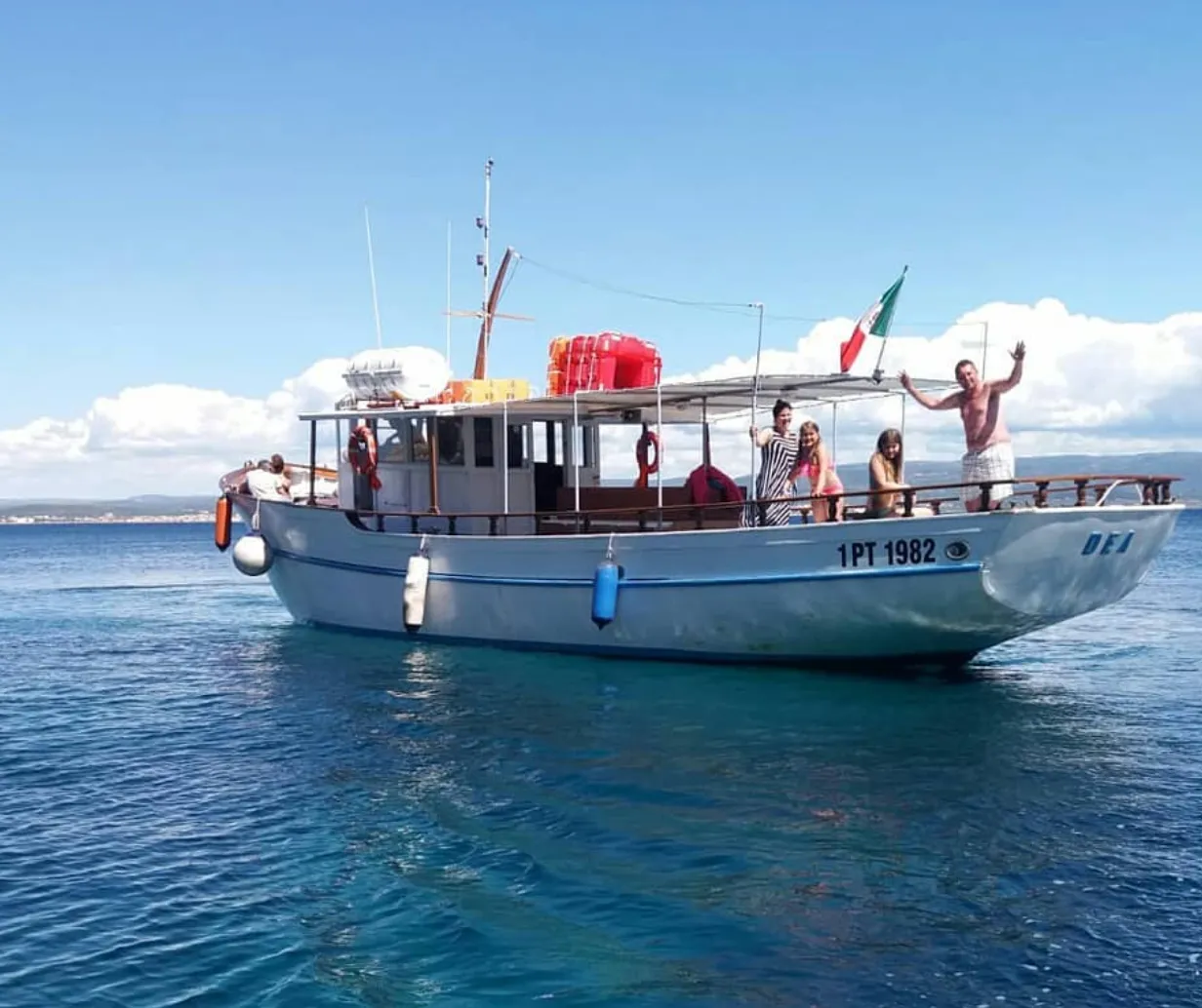 Aperitivo in barca con avvistamento delfini da Alghero